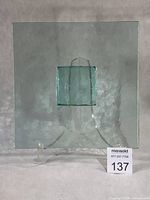 Front view square glass platter on stand