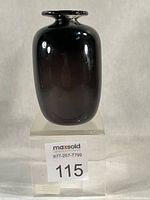 Front view of smokey brown blown glass vase