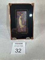 Full view of framed artwork with lot number