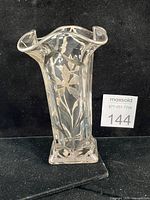 front view of square-footed glass vase with silver overlay floral design