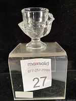 Front view showing hen profile and egg cup opening