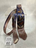 Full view of necktie front showing motif and colour gradient