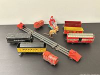 Group shot of all train cars, track sections, robot, kangaroo and bumpers