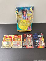 Group shot of all five packaged toys