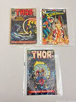 All three bagged comics displayed front side