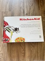 retail box front showing KitchenAid spiralizer with text details