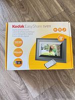 Front view of Kodak EasyShare SV811 retail box showing product image and specifications