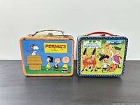 Front view showing both lunch boxes closed, exterior graphics and handles