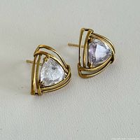 Pair of triangular 14kt gold stud earrings with glass stones