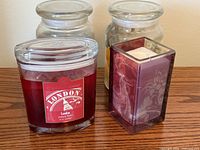 Group shot showing Colonial Candle, purple holder, two large jar candles