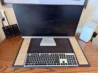 Front view of ASUS all-in-one PC with keyboard