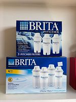 Front view of both Brita pitcher filter boxes showing quantities 3 and 4