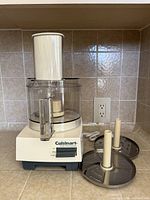 Full view of processor assembled with two discs beside it