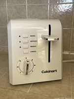 Front side view showing controls and dial