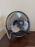 Front view of Massey desk fan showing blades, grill and stand