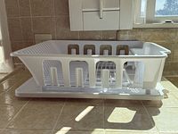 Dish rack seated on matching drainboard