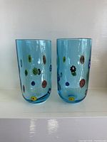 two blue Murano millefiori tumbler glasses front view