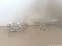 pedestal cake stand and cut glass bowl side by side