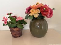 Front view of both faux floral arrangements