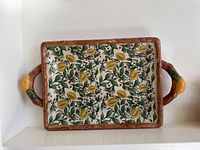 Full view of rectangular ceramic serving dish showing pattern and handles