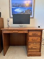 Front view showing full desk, drawers, drop-front pencil drawer