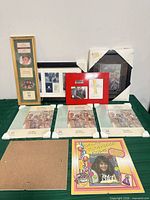 Overall group of nine assorted frames on table