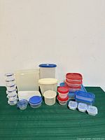 Group view of all plastic containers showing variety of shapes, sizes and colours