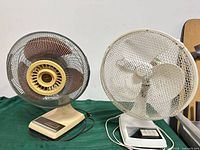 Front view of both 12-inch table fans