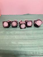 front view of five black track heads