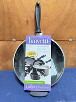 Front view of Bravetti sauté pan in packaging showing brand and capacity