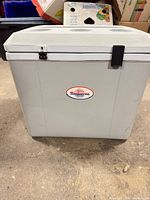 Front of Koolatron cooler showing logo and latches