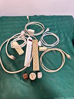 Group shot of all power strips, extension cords and adapters