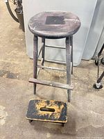 Bar stool and step stool together showing overall design and wear