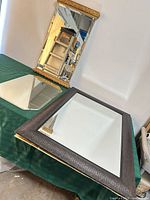 All three mirrors grouped on table for scale and variety