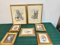 Front view showing all seven framed prints