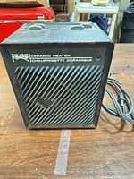 Front view showing brand name and grille