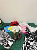 All items laid out: dress, heels, multiple bandanas.