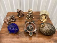 All seven animal figurines on tabletop