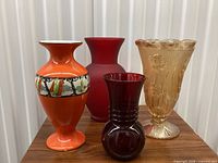 Front view of all four vases on tabletop