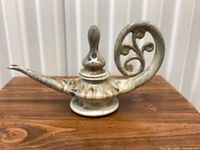 full side view showing overall form and glaze