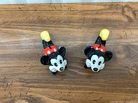 Top view of both crawling ceramic Mickey & Minnie figurines