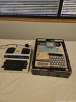 TTY device, power adapter, and box overview