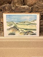 Full view of signed Kiawah Ocean Course art print on backing board