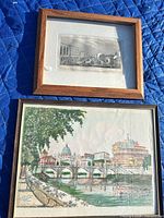Both framed artworks laid out: top Rochester engraving, bottom Rome etching