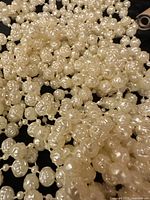 close-up of pearlized bead strands