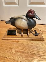 Full view of decoy on base with anchor weight