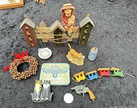 All nine miniatures displayed with quarter for scale