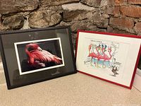 Both framed flamingo prints side by side showing full lot