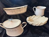 All four china pieces displayed together