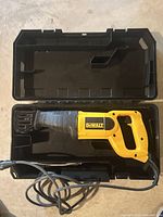 Open case with DeWalt reciprocating saw and cord